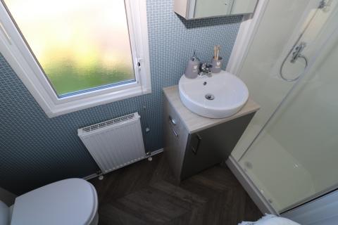 Family bathroom with shower in this luxury static caravan