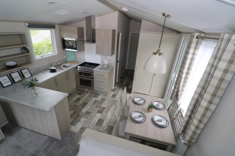 Dining area and kitchen in this caravan at Silverbow Country Park