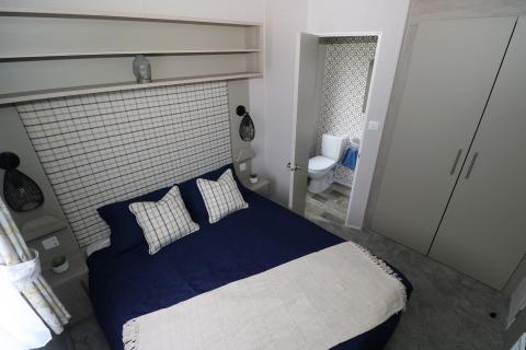 Master double bedroom in the 2021 Atlas Onyx static caravan for sale