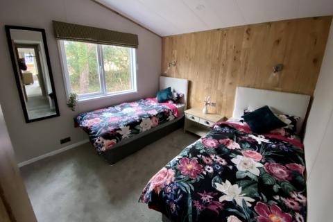 twin bedrooms at the 2021 Atlas Debonair Lodge