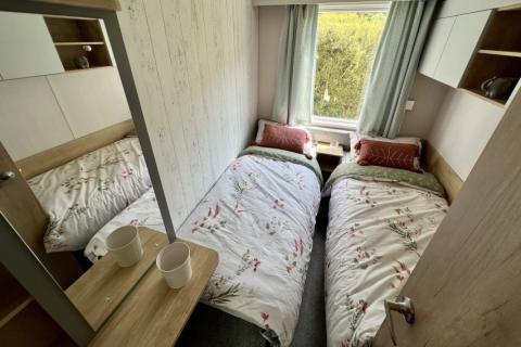 Twin bedroom in the 2023 Swift Moselle