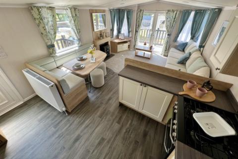 kitchen and lounge in the 2023 Swift Burgundy 36x12