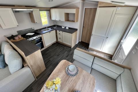 kitchen and dining area in the 2023 Swift Burgundy