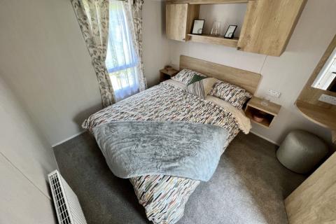 double bedroom in the 2023 Swift Burgundy