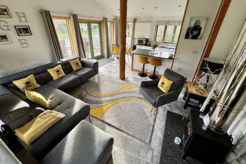 2013 Gart Eco Home lounge area with woodburner