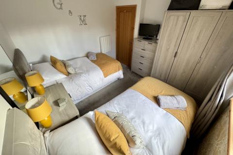second view of the twin bedroom