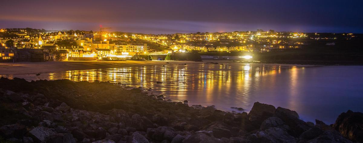 st ives in Cornwall in the evening with lights overlooking the beach