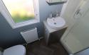 Family bathroom with shower in this luxury static caravan