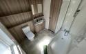 luxury bathroom with bath in the 2023 Swift Edmonton Lodge